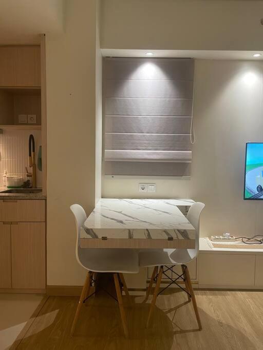 Apartemen Cozy In With View